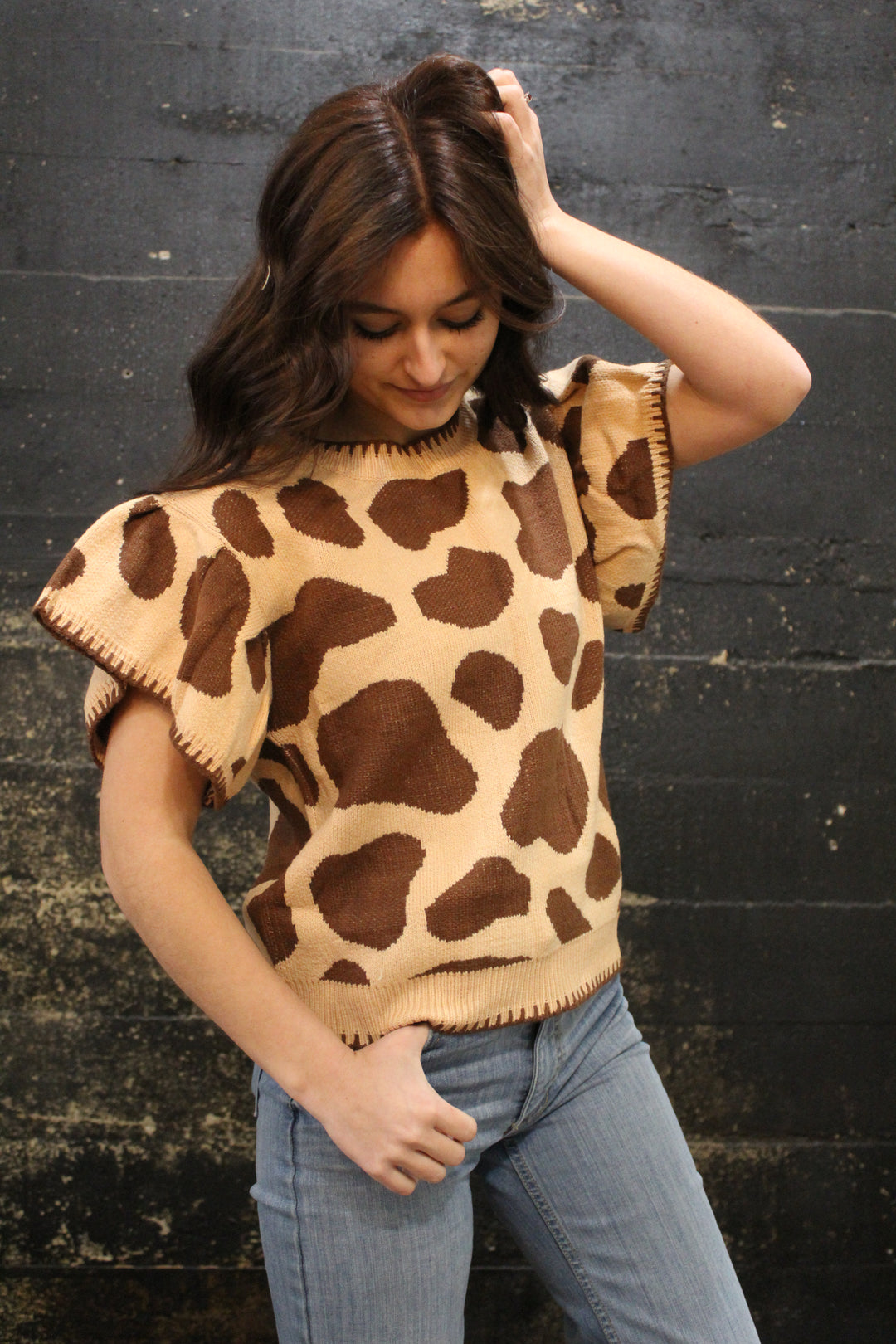 Cow Printed Knit Ruffle Top