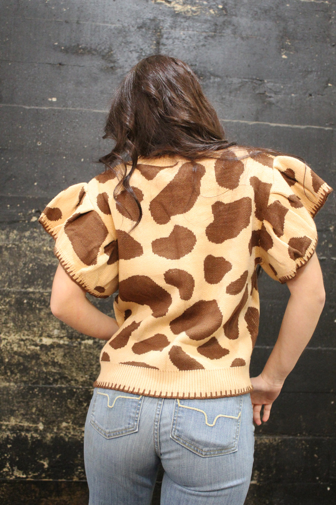 Cow Printed Knit Ruffle Top